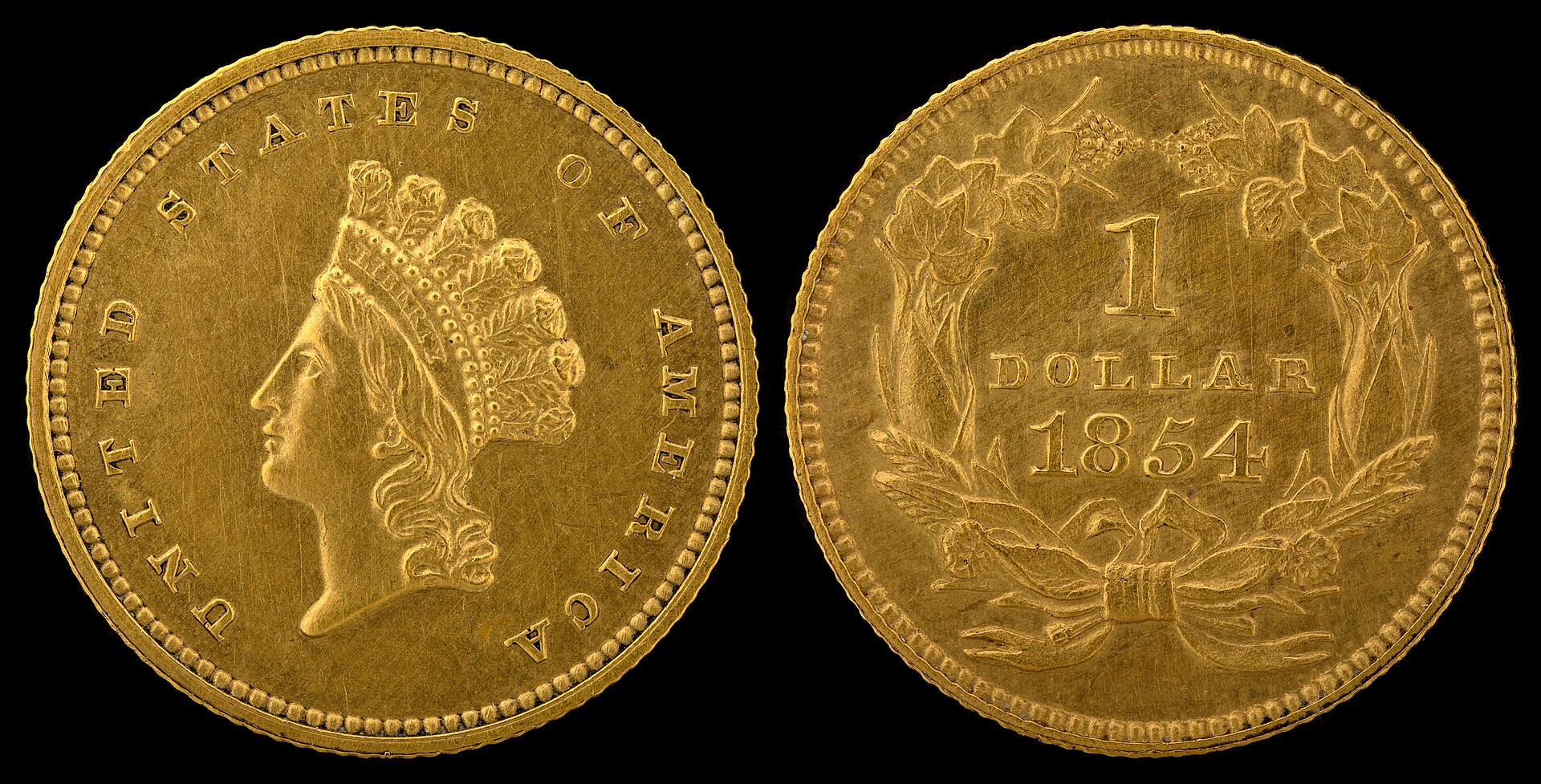 This is the TYPE 2 small Indian Head gold dollar coin.