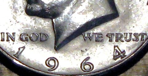 A 1964 Kennedy silver dollar. 