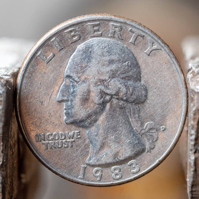 This is a 1983-D Washington quarter.
