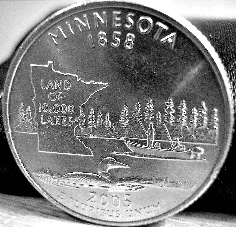 An example of the 2005 Minnesota quarter error (extra tree). 