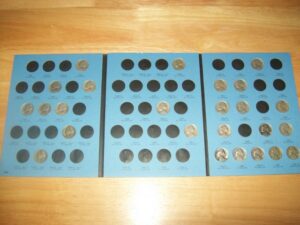 This incomplete collection of Jefferson nickels is being displayed in a Whitman Jefferson nickel coin folder. photo by Joshua at TheFunTimesGuide.com jefferson-nickels-josh