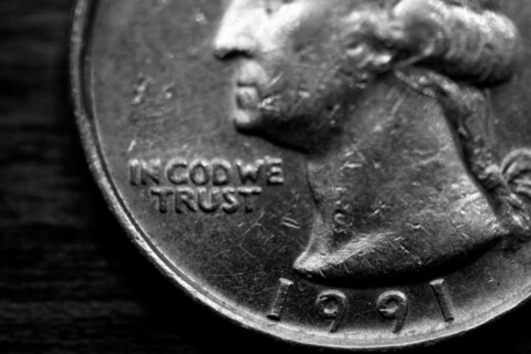Closeup of a worn quarter. 