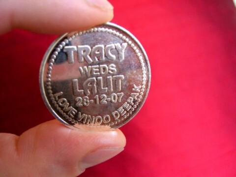 A personalized custom coin commemorating a couple's wedding date anniversary. photo by willsfca on Flickr a personalized custom coin is a novelty coin