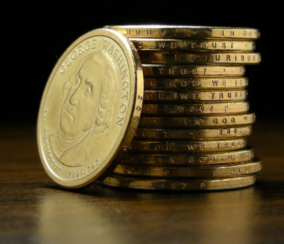 Notice the engraving of words on the edge of the Presidential Dollar Coins.