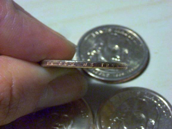 Whether your coin has edge lettering like this or not, it's helpful if you can show potential buyers what the edge of your coin looks like. photo by romulusnr on Flickr