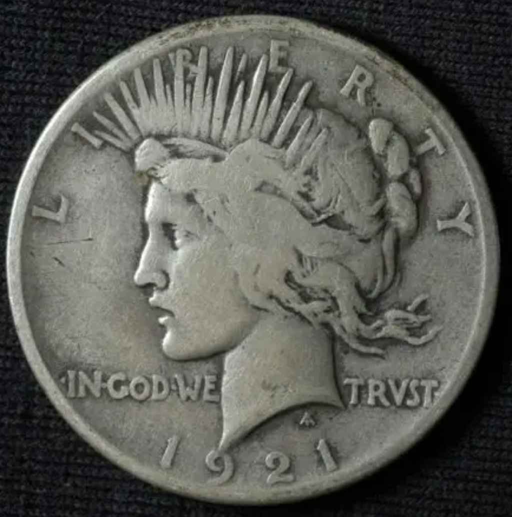 Even though both are silver dollars, a 1921 Peace dollar (pictured here) is worth more than a 1921 Morgan dollar. That's largely because there are many more 1921 Morgan dollars than 1921 Peace dollars known to exist. photo by jamescapp02 on Flickr