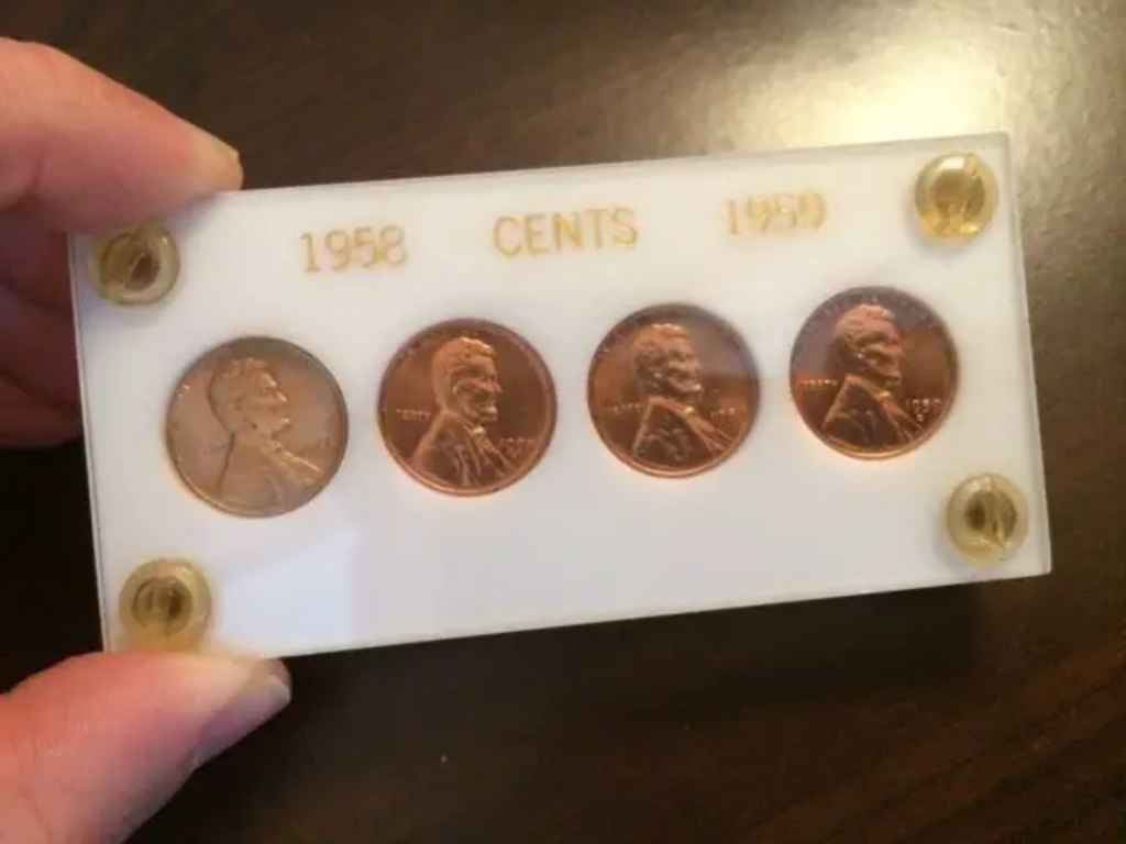 Here are 4 pennies. They may look the same, but they are distinctly different - 1958, 1958-D, 1959, and 1959-D. The 1958 pennies have the wheat ear reverse, and the 1958 cents feature the Lincoln Memorial. Coin values are different for each of these. 