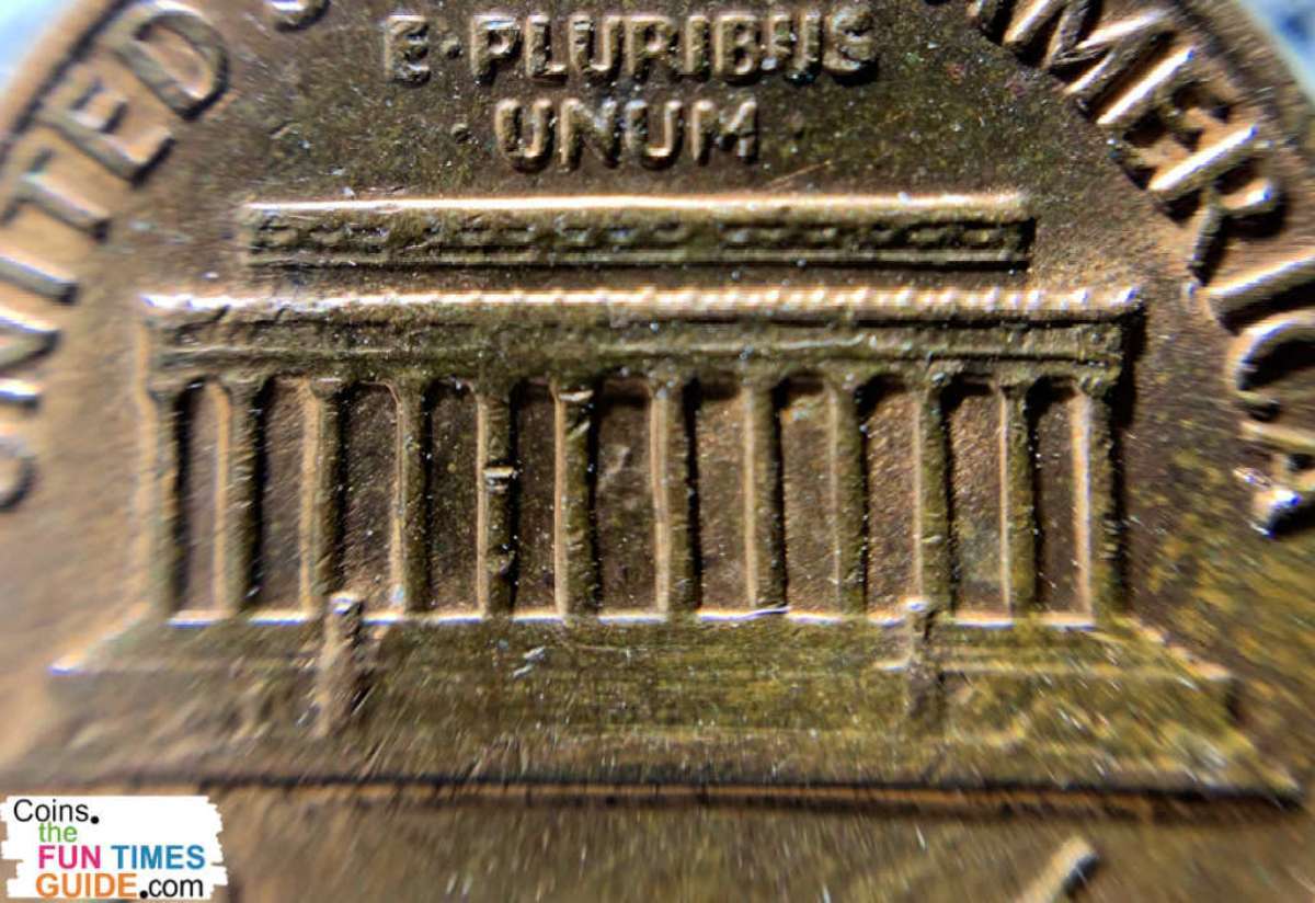 Notice the lines connecting the roof to the rest of the building are extremely weak on this floating roof penny.