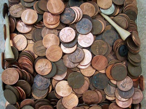 A glance inside my spare change jar as it looks today with all of the valuable coins removed. It's just a bunch of pennies, a few buttons, and a couple golf tees now. Someday I need to put all of those pennies into coin rolls! photo by Lynnette at TheFunTimesGuide.com A glance inside my spare change jar as it looks today with all of the valuable coins removed. It's just a bunch of pennies, a few buttons, and a couple golf tees now. Someday I need to put all of those pennies into coin rolls!