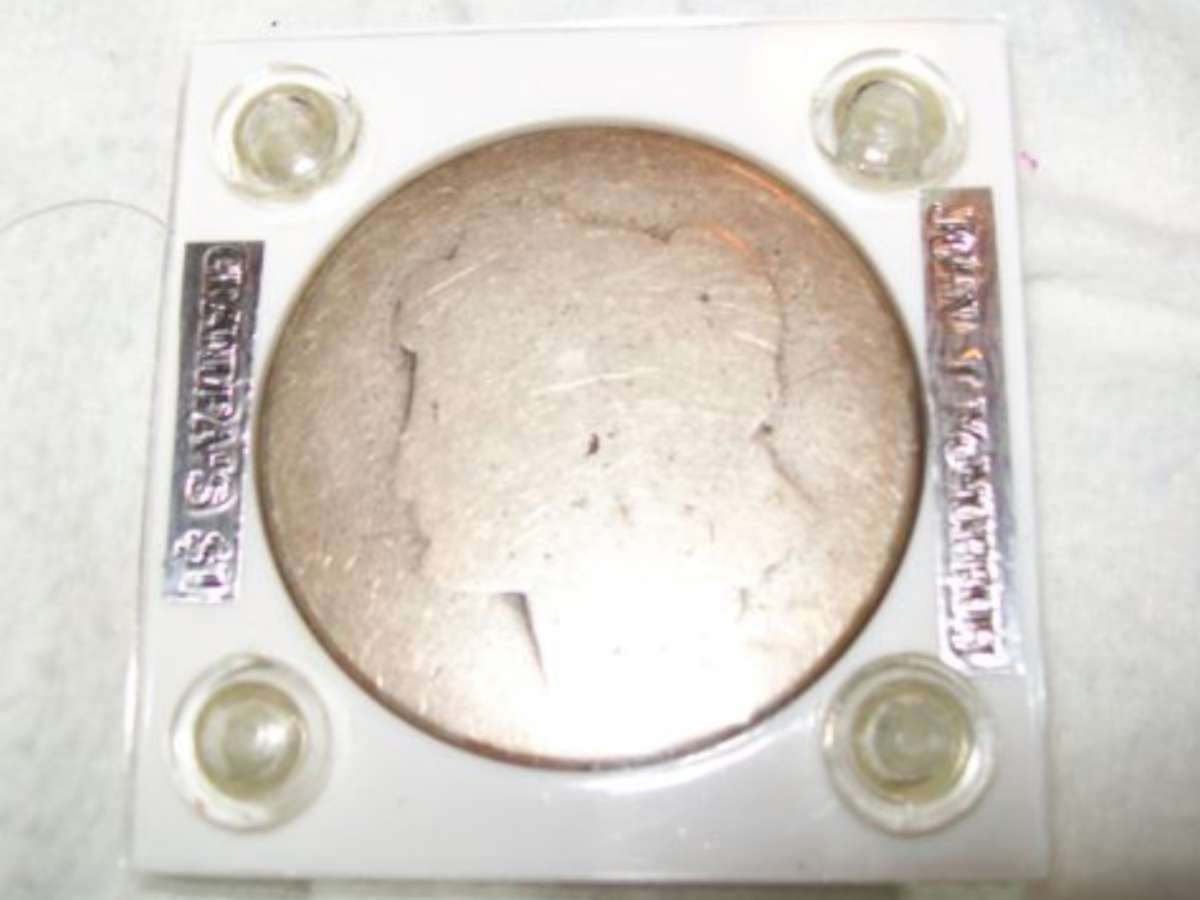 Low ball coins like this are very well worn and are among the worst specimens of their coin type. Photo by JoshuaTheFunTimesGuide Low ball coins like this are very well worn and are among the worst specimens of their coin type.