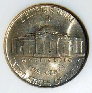 This is a U.S. war nickel. Notice the large "D" over the dome of Monticello? The war nickels that have silver in them will have a large mintmark (either P or D or S) on the reverse side of the coin. photo is public domain This is a U.S. war nickel. Notice the large "D" over the dome of Monticello? The war nickels that have silver in them will have a large mintmark (either P or D or S) on the reverse side of the coin.
