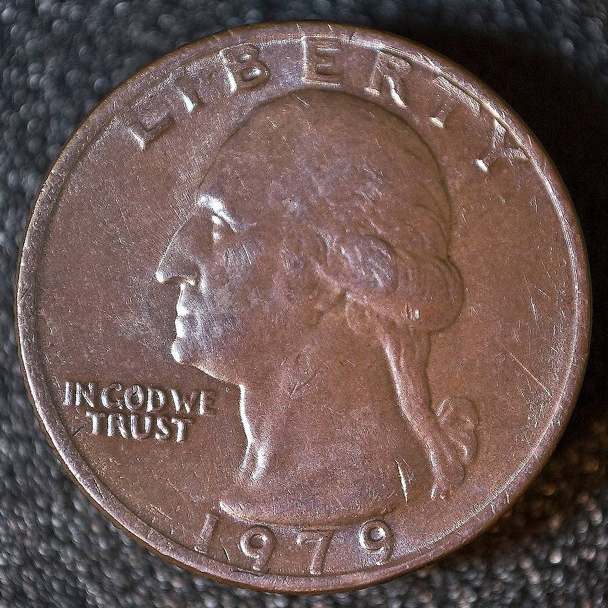 This error quarter is missing the clad layer over its copper core. 